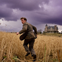 The House That Distorts the Sky The man ran anxiously across the field, and the mere sight of the hill made him doubt the reliability of the world. It was not the house itself that unsettled...